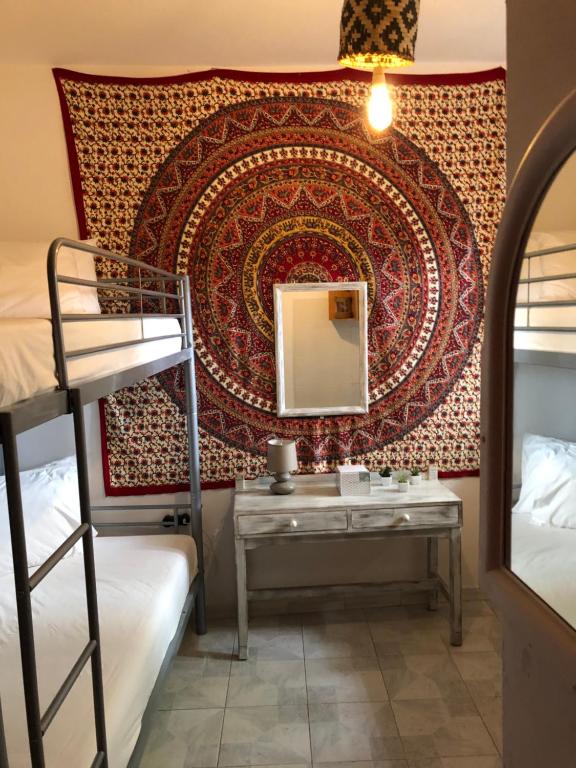 Postel nebo postele na pokoji v ubytování Rhodes Backpackers Boutique Hostel and Apartments