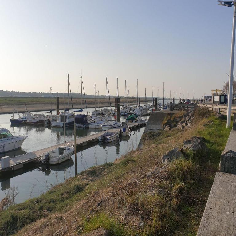 a bunch of boats are docked in a harbor at LE GALOPIN Etaples le Touquet in Étaples
