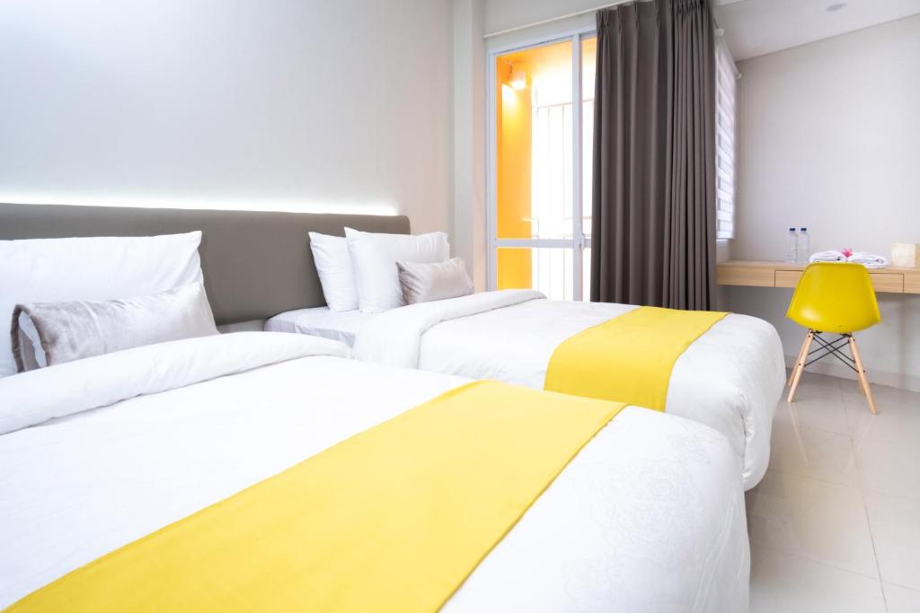 Postel nebo postele na pokoji v ubytování S101 Hotels