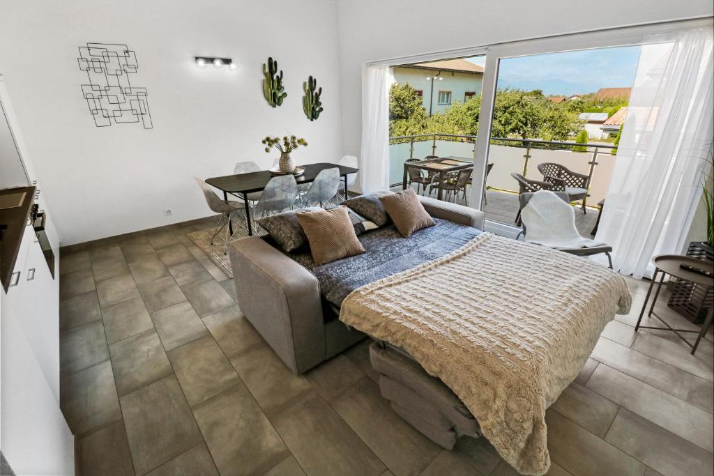 Posezení v ubytování Superbe appartement neuf et cosy
