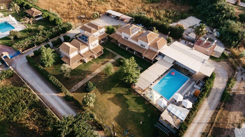 an aerial view of a house with a swimming pool at Alea Villas in Kourouta