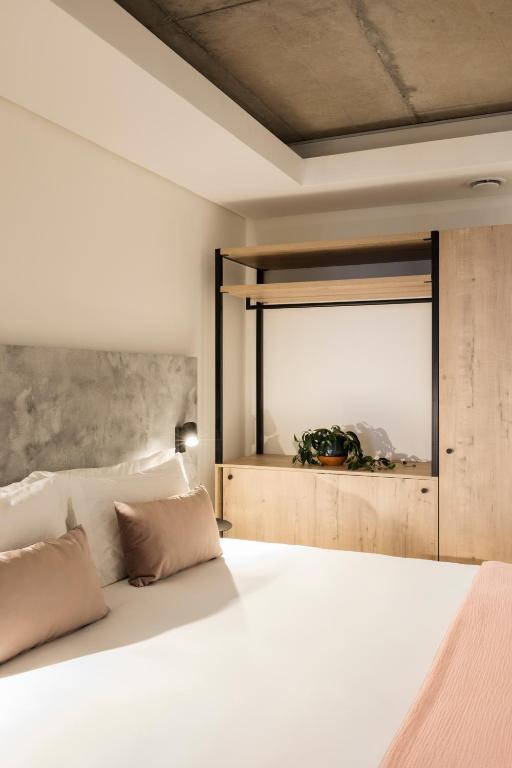 Postel nebo postele na pokoji v ubytování Home Suite Hotels Station House