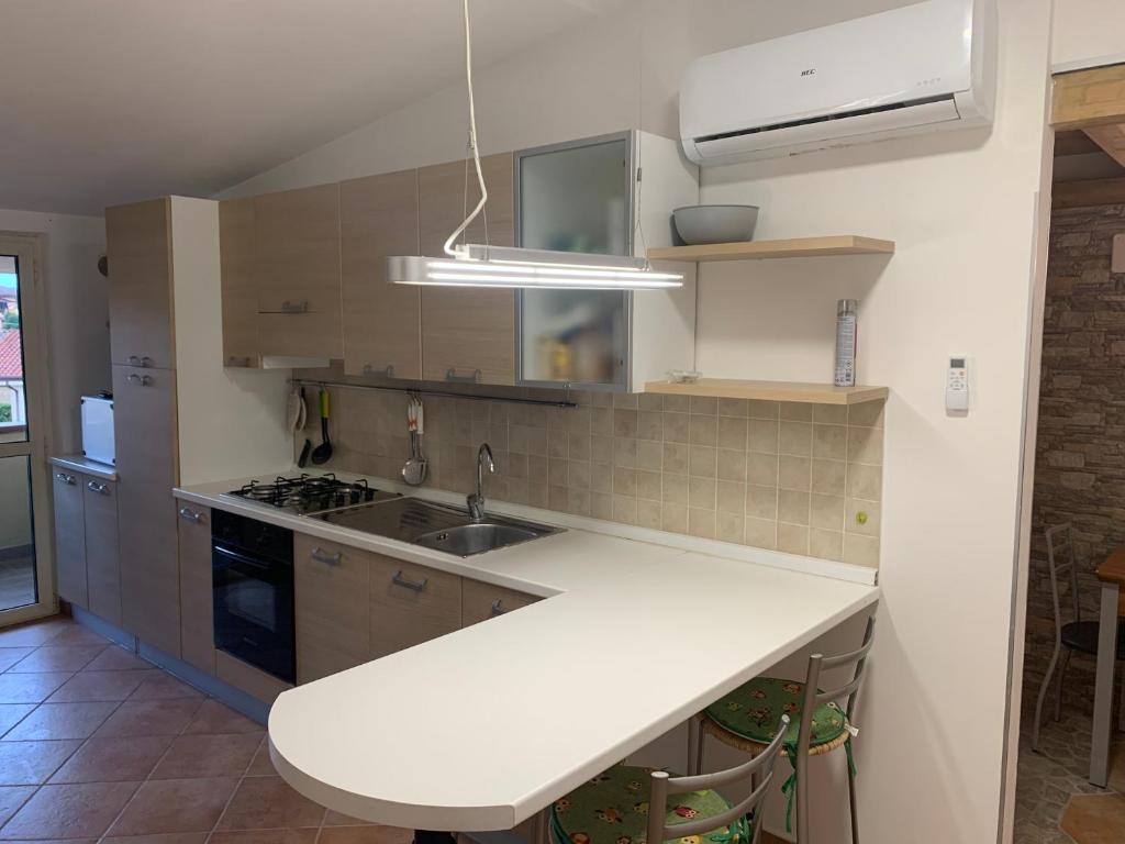 a kitchen with a sink and a counter top at Oasi del patricano, Patrica in Patrica