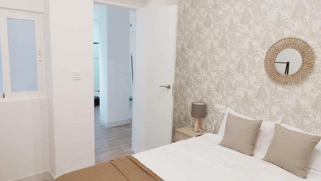 A bed or beds in a room at Realejo Lovely Flat