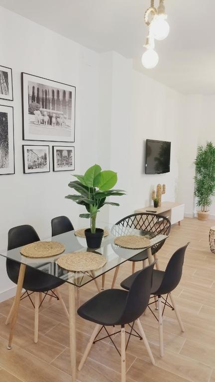 A television and/or entertainment centre at Realejo Lovely Flat