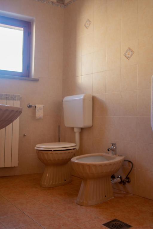 Koupelna v ubytování Apartma Na skdnu