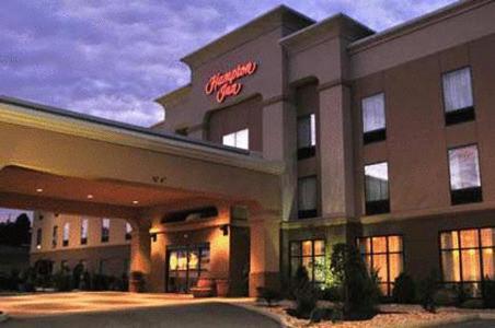 a large building with a large clock on the front of it at Hampton Inn Indiana in Indiana
