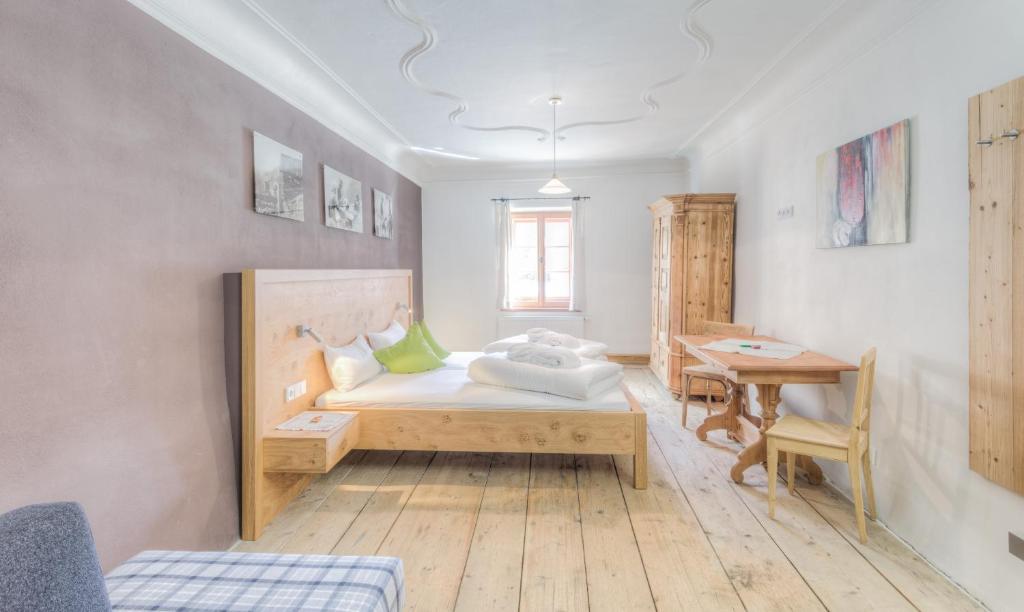 Postel nebo postele na pokoji v ubytování Exclusive Apartment Tassenbacherhof