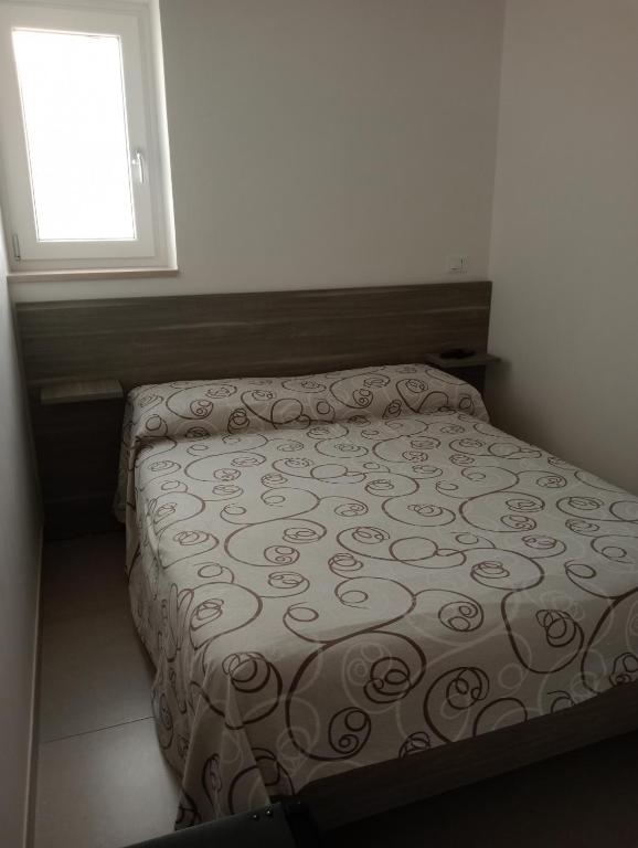 Postel nebo postele na pokoji v ubytování U Ceccenate