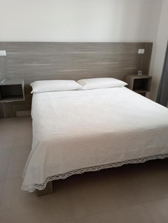 Postel nebo postele na pokoji v ubytování U Ceccenate