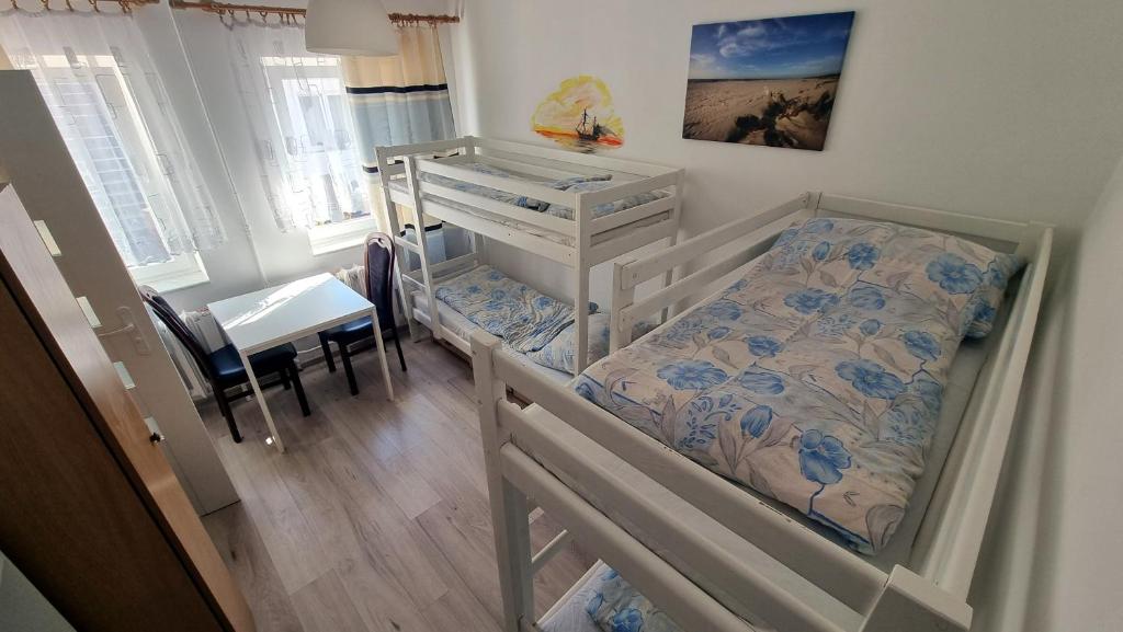 Posteľ alebo postele v izbe v ubytovaní Ośrodek BEATA / FIORD