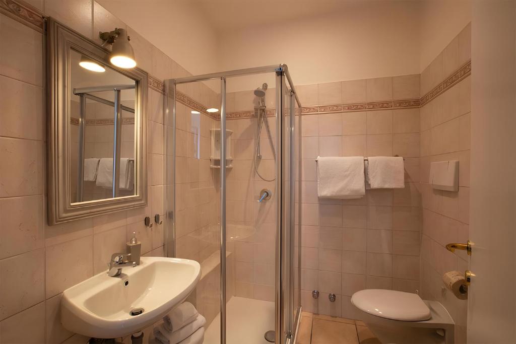 Koupelna v ubytování Hotel Orso Bruno