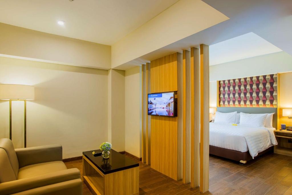 Postel nebo postele na pokoji v ubytování Best Western Kamala Jimbaran