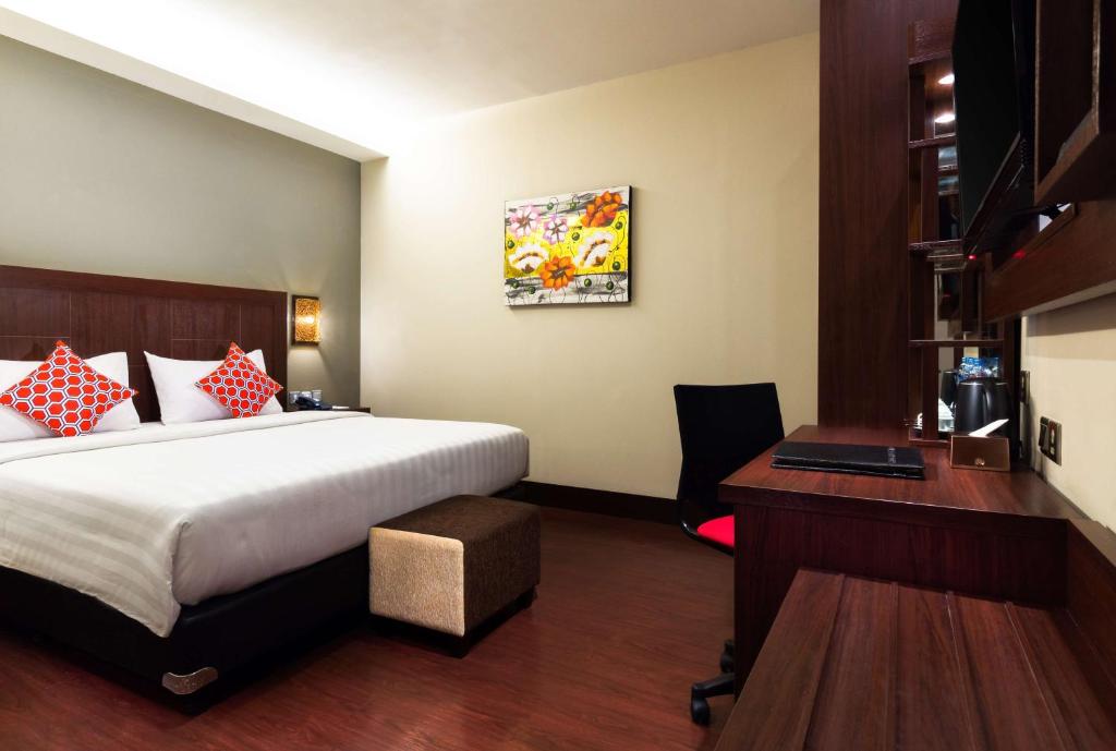 Postel nebo postele na pokoji v ubytování Best Western Senayan