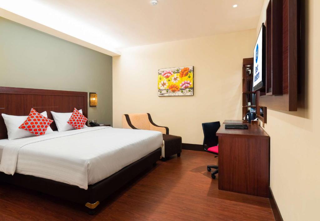 Postel nebo postele na pokoji v ubytování Best Western Senayan