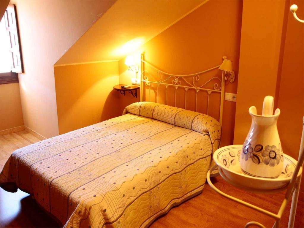 Postel nebo postele na pokoji v ubytování Hosteria Hijuelas