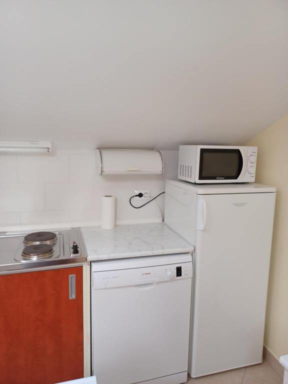 Kuchyň nebo kuchyňský kout v ubytování Apartman Alen