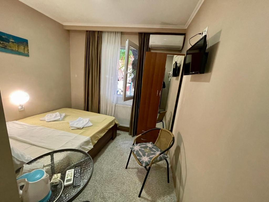 TV a/nebo společenská místnost v ubytování Hotel Maria