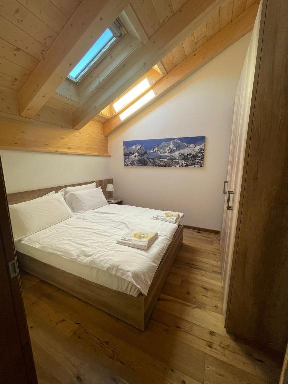 Postel nebo postele na pokoji v ubytování Ai Suma Residence