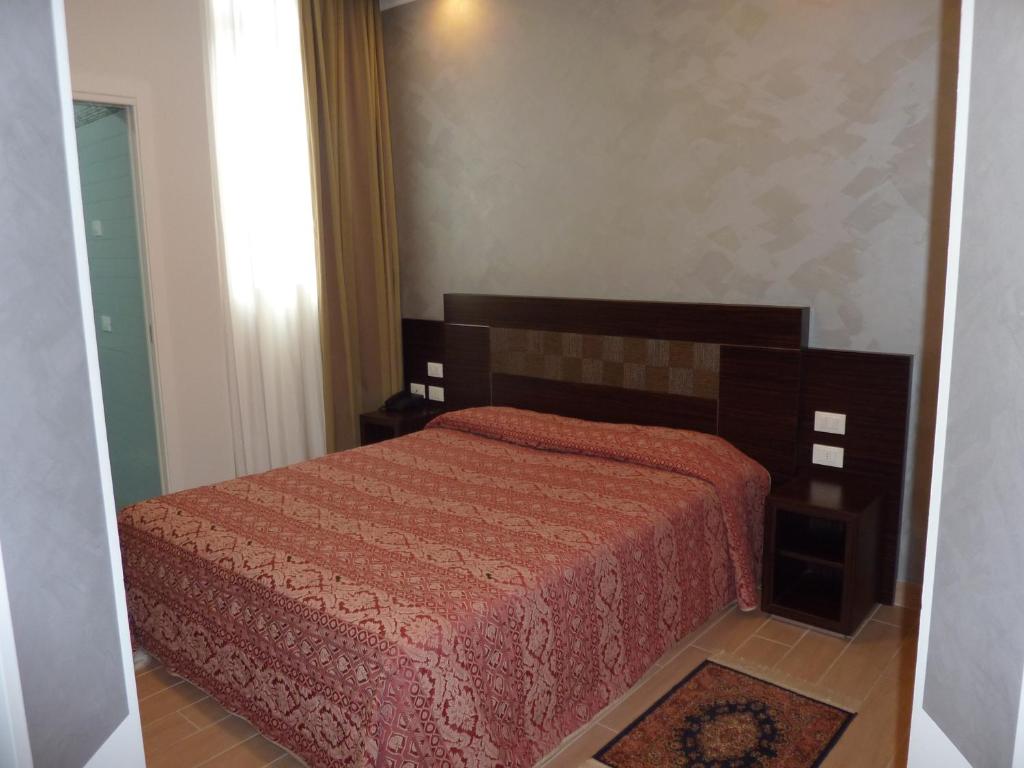 Postel nebo postele na pokoji v ubytování Alla Bianca Hotel