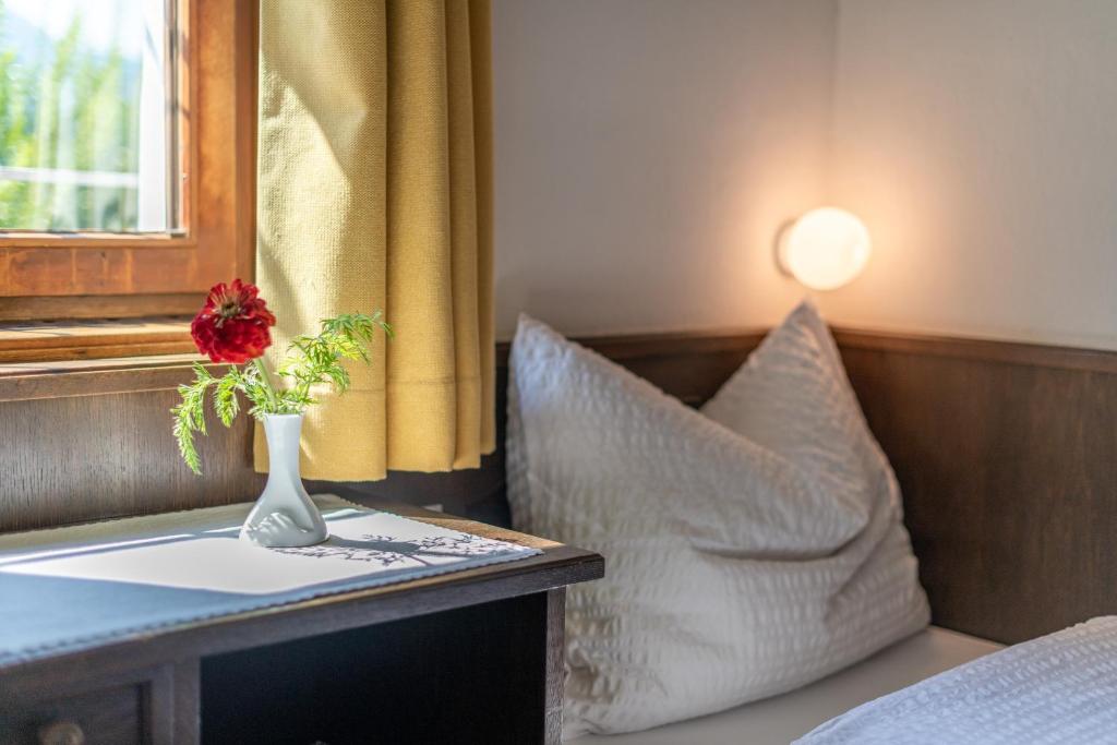 Postel nebo postele na pokoji v ubytování Haus Oberhofer