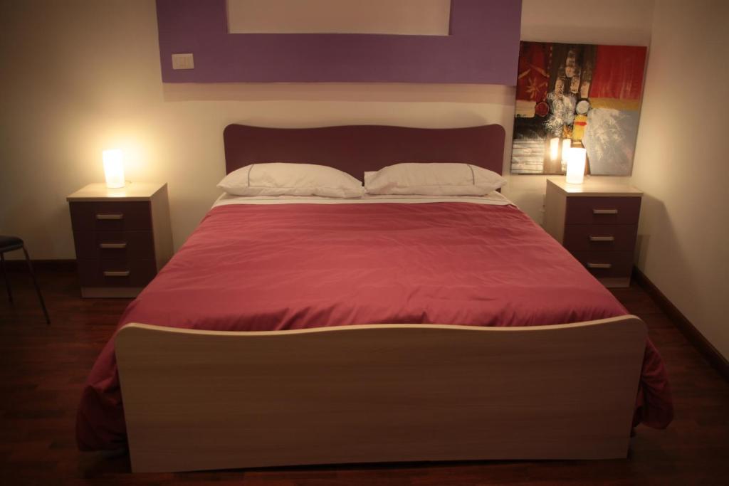 Posteľ alebo postele v izbe v ubytovaní B&B Cosenza