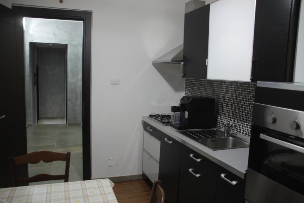 Kuchyňa alebo kuchynka v ubytovaní B&B Cosenza
