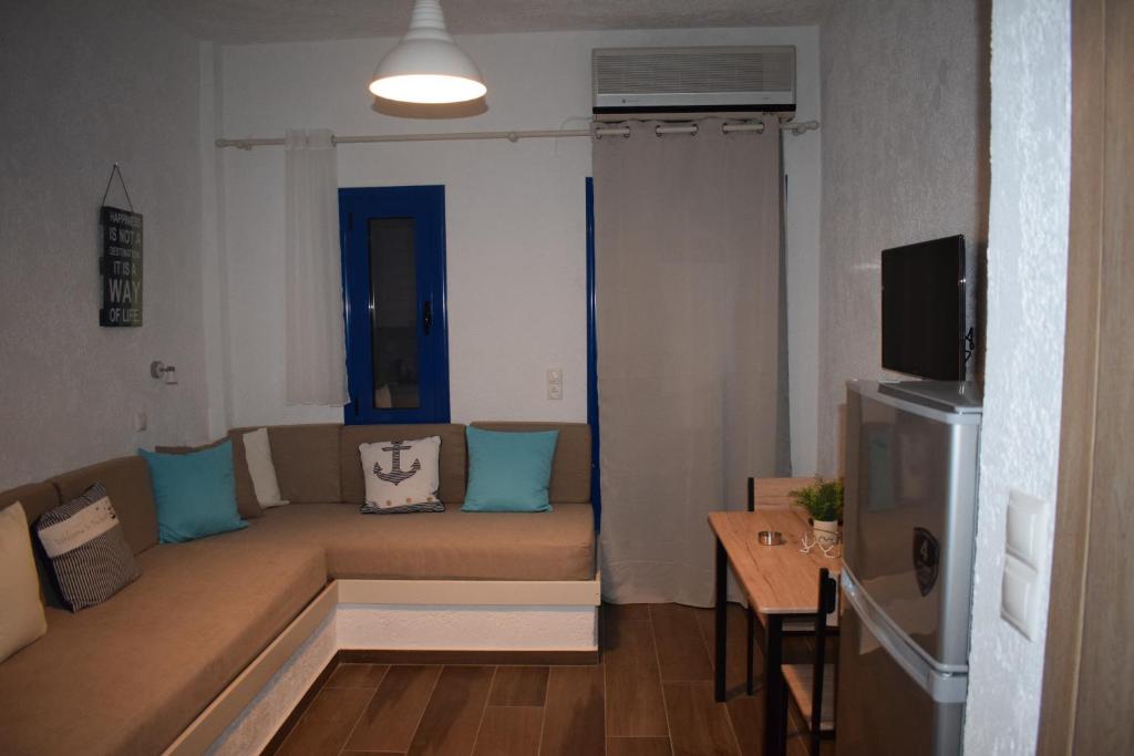 Televízia a/alebo spoločenská miestnosť v ubytovaní Katovigli Seaview Apartment