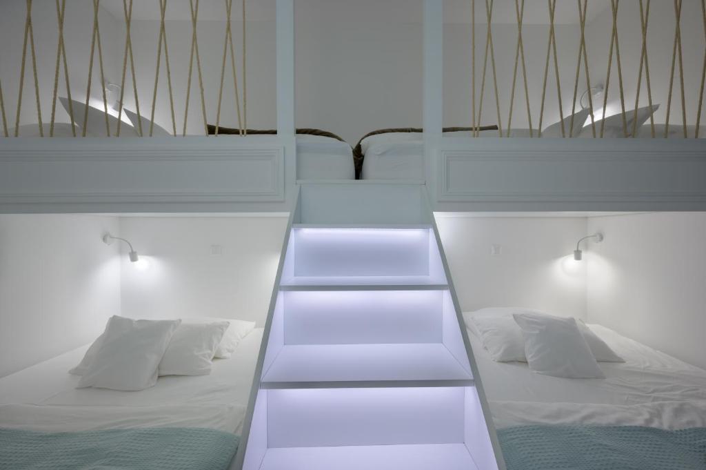 A bed or beds in a room at KOA Spa Villa-Luxury villa in Gialova with own Spa