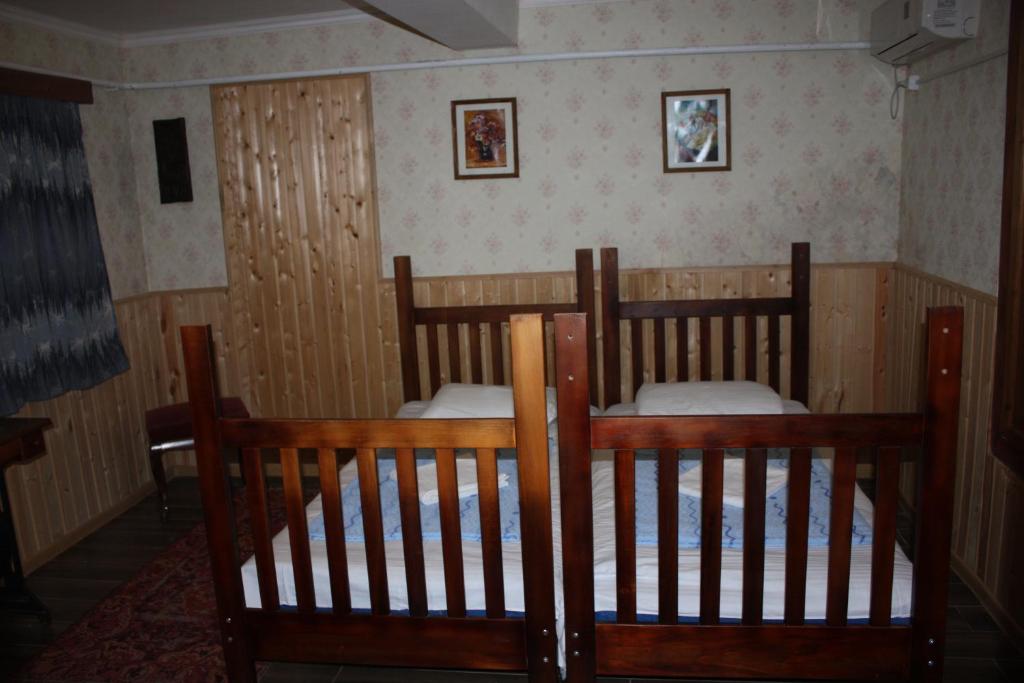 Postel nebo postele na pokoji v ubytování Sun Guest House