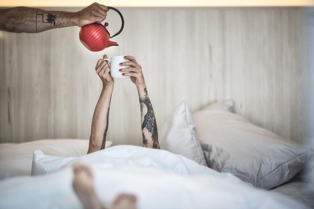 Postel nebo postele na pokoji v ubytování Hotel die Arlbergerin -New- all-in super flex rate