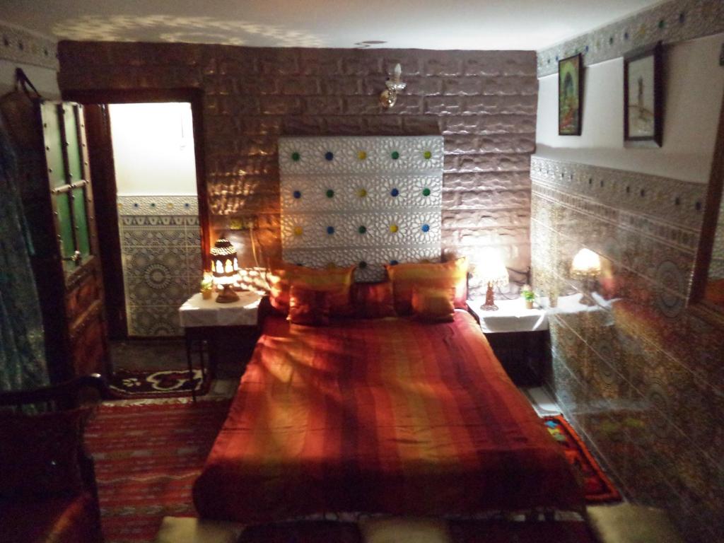 Postel nebo postele na pokoji v ubytování Dar Nouzha A