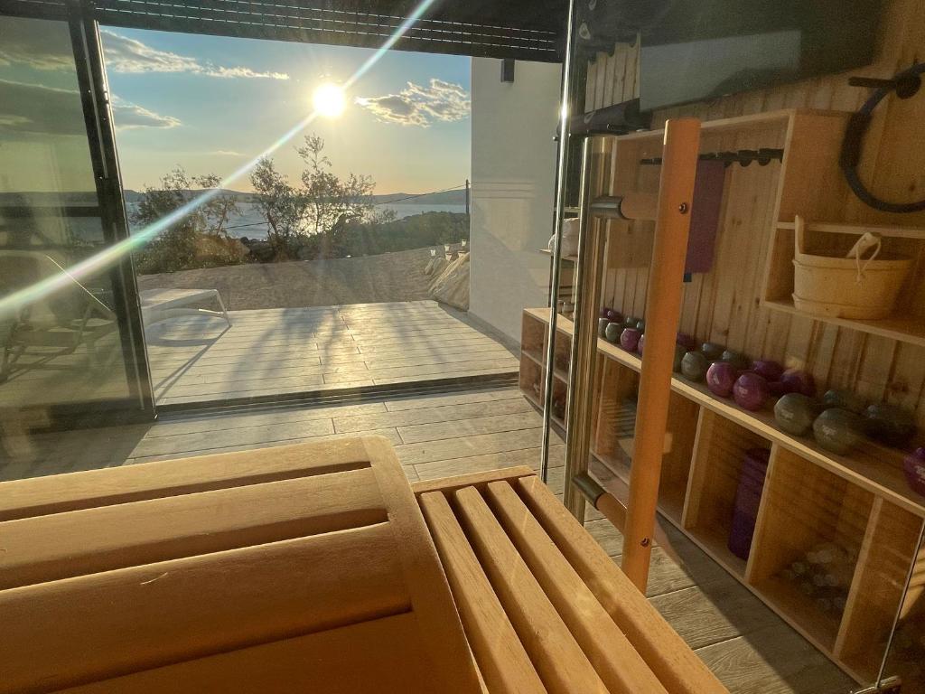 A balcony or terrace at KOA Spa Villa-Luxury villa in Gialova with own Spa