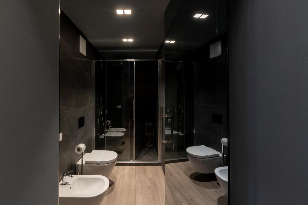 Koupelna v ubytování DiVino Rooms Deluxe