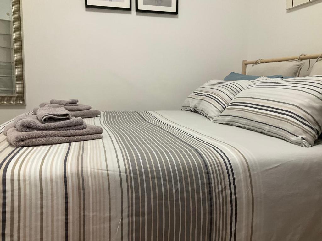 Posteľ alebo postele v izbe v ubytovaní Studio 25 apartment - near metro M3