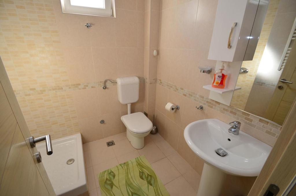 Koupelna v ubytování Muo Apartments