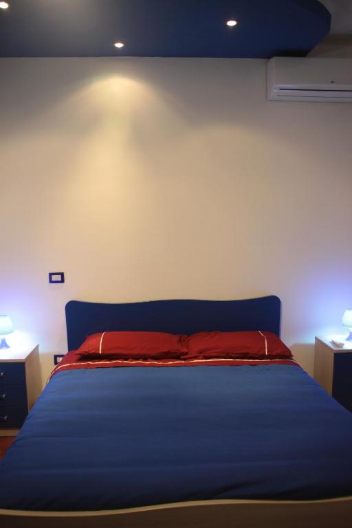 Posteľ alebo postele v izbe v ubytovaní B&B Cosenza