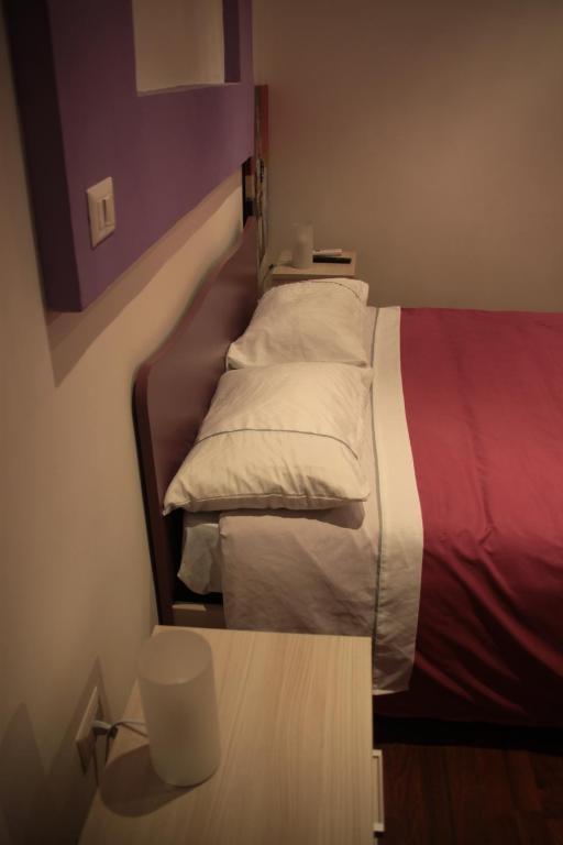 Posteľ alebo postele v izbe v ubytovaní B&B Cosenza