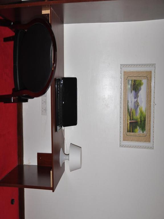 TV a/nebo společenská místnost v ubytování Monalisa Hotel