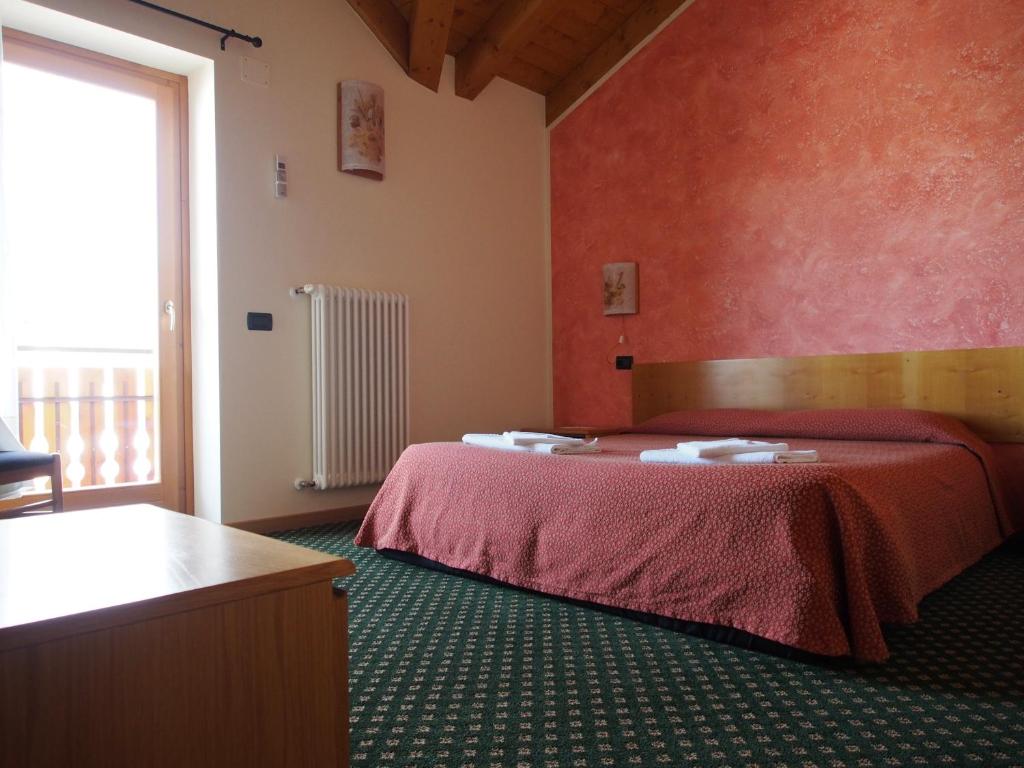 Postel nebo postele na pokoji v ubytování Hotel Belvedere
