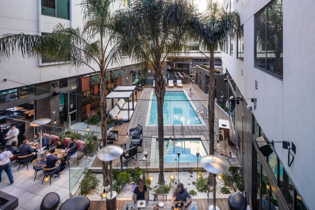 an overhead view of a pool in a building at Shashi Hotel Mountain View, an Urban Resort in Mountain View