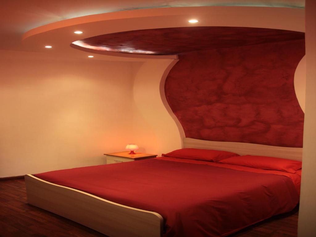 Posteľ alebo postele v izbe v ubytovaní B&B Cosenza