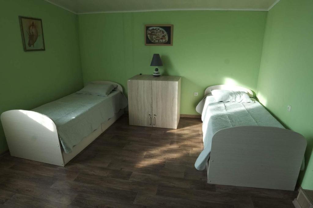 Postel nebo postele na pokoji v ubytování НордВест