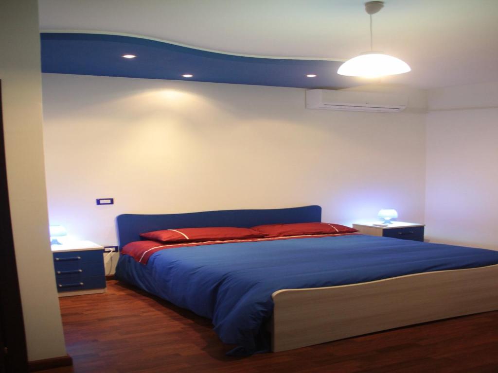 Posteľ alebo postele v izbe v ubytovaní B&B Cosenza