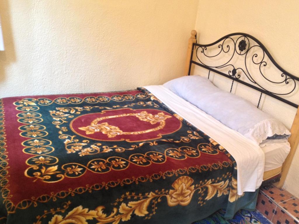 Letto o letti in una camera di Riad Espagne