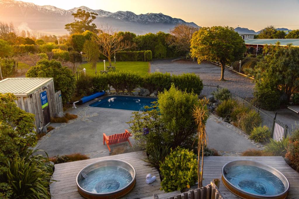 an aerial view of a backyard with a swimming pool at Alpine-Pacific Holiday Park in Kaikoura