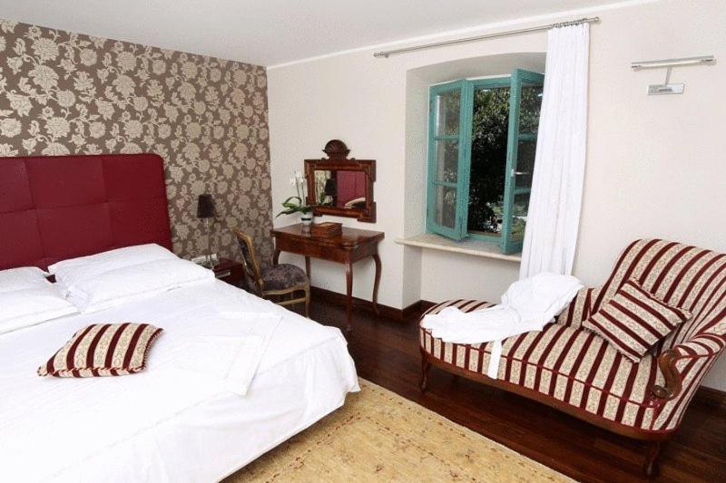 Posteľ alebo postele v izbe v ubytovaní Boutique Hotel Vela Vrata