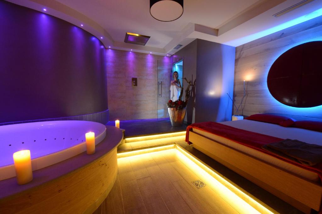 Postel nebo postele na pokoji v ubytování Hotel Ambassador