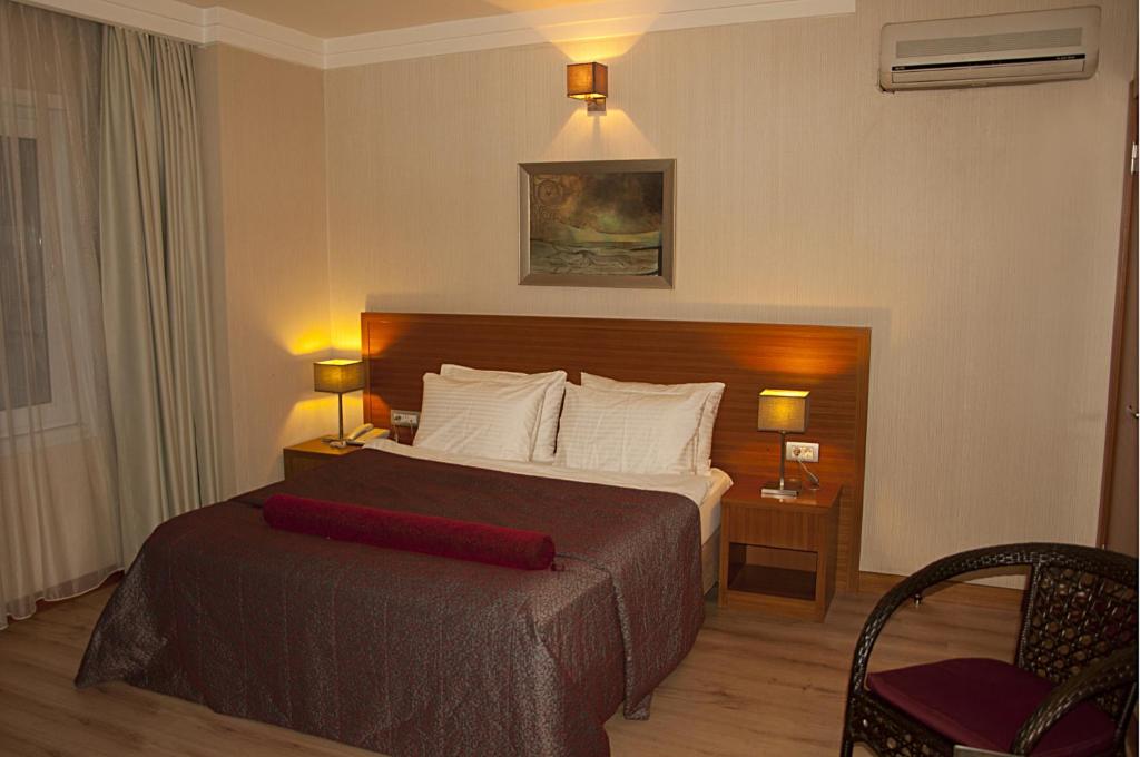 Postel nebo postele na pokoji v ubytování Island Hotel