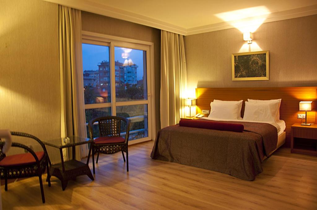 Postel nebo postele na pokoji v ubytování Island Hotel